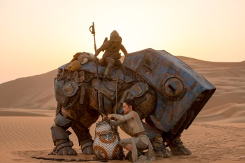Star Wars: The Force Awakens..L to R: BB-8 w/ Rey (Daisy Ridley)..Ph: David James..©Lucasfilm 2015